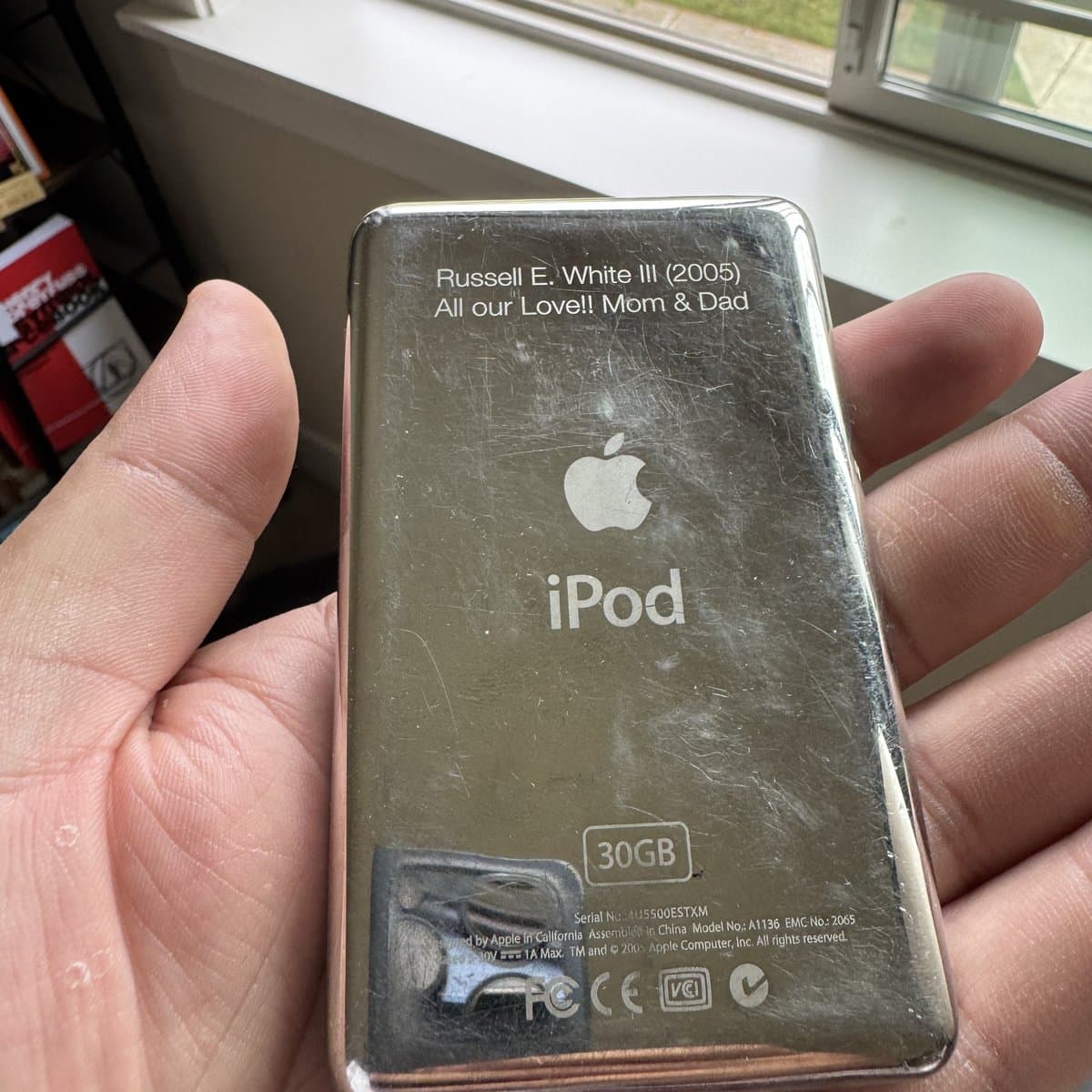 The engraved steel back of the iPod: Russell E. White III (2005), All our Love!! Mom & Dad